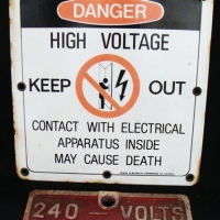 Lot 130 - 4 x signs - Vintage enamel 'danger keep out high voltage sign', aluminum '24 volts', etc - Sold for $87