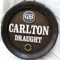 Vintage novelty beer barrel end sign Carlton draught - Sold for $35