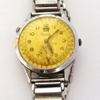 1960s Rone Swiss calendar watch in chrome and stainless steel - Sold for $62