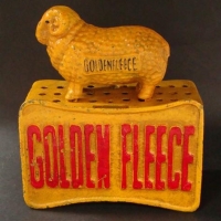 Reproduction 'Golden Fleece' cast iron money box with the Ram on a crate - Sold for $99