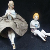 2 x C1900 German porcelain tea cosy  piano doll with number to back - Sold for $62 - 2017