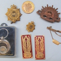 Group lot military badges and jewelry inc - Rising Sun hat badge, service corps badges epaulets etc - Sold for $50 - 2017