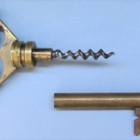 Vintage well made Heavy Brass Novelty KEY shaped Corkscrew - Pierced handle w Anchor to centre & jeweled Port & Starboard decoration either side - no  - Sold for $37 - 2017