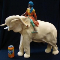 Large 1920's vintage plaster elephant with mounted Blackamoor figure - approx h 60cm - Sold for $224 - 2017