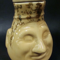 1930s Australian pottery Face jug by Sunshine Electrics and Bendigo pottery in cream with green and brown glaze - Sold for $621 - 2017