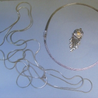 Group lot jewellery incl very long silver chain, snake link chain & pendant - Sold for $31 - 2017