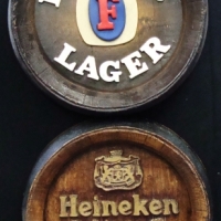 2 x vintage faux barrel ends advertising wall plaques inc - Fosters Lager and Heineken - Sold for $35 - 2017