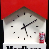 Large vintage timber Marlboro advertising electric wall clock, shaped like a packet of smokes - 72x50cm - Sold for $99 - 2017