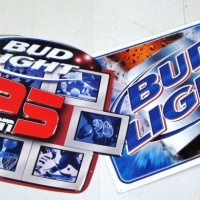 Pair 'Bud Light' pressed metal beer advertising signs - Sold for $47 - 2017