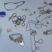 Small box of silver jewellery, charm bracelets, charms, pendant, bracelet, chains, earrings, AMV millefiori etc - Sold for $37 - 2017