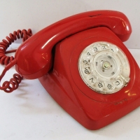 Vintage red rotary dial telephone - Sold for $35 - 2017