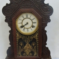c1900 Waterbury Clock Co USA cottage clock with carved timber decoration - Sold for $112 - 2017