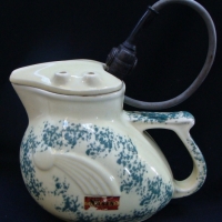 c1930's Nilsen Australian Pottery 'Kookaburra' electric jug with mottled green glaze - Sold for $43 - 2017