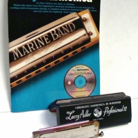 2 x pieces incl 'Play Harmonica' book with CD and cased 'The Larry Adler Professional 12' harmonica - Sold for $118 - 2017