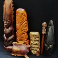 Group of Oceanic wooden carvings including Sepik mask with pierced nose, scepter, Hardwood Hawaiian tiki, turtle etc - Sold for $31 - 2017
