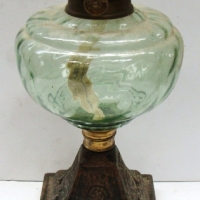 c1900 Oil lamp with cast iron base and  green glass Bowl - Sold for $25 - 2017