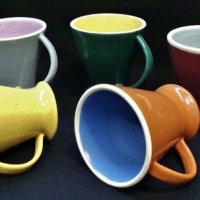 Group lot Australian pottery  multi coloured mugs by Isobel Melbourne - Sold for $27 - 2017
