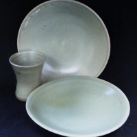1970s Australian Harold Hughan stoneware pottery plates and mug with Celadon glaze - tallest 19cm - Sold for $56 - 2017