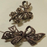 2 x vintage Silver Marcasite Brooches - floral spray & filigree bow - Sold for $56 - 2017