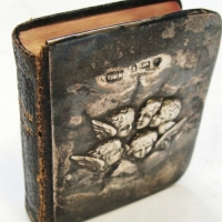 Small c1900 Book of Common Prayer with Sterling Silver cupid embossed cover - Sold for $37 - 2017