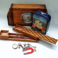 3 x pieces incl marquetry box with contents, art deco style silky and Tasmanian oak mantel clock and vintage tin - Sold for $27 - 2017