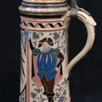 Large German ceramic stein with pewter lid & embossed black eagle decoration - Sold for $68 - 2017