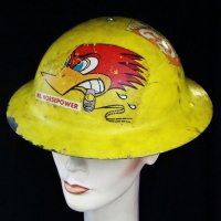 WW1 steel helmet decorated  with snoopy & road runner decals - Sold for $31 - 2017