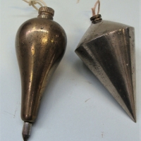 2 x Vintage plumb bobs brass and steel  both monogrammed - Sold for $62 - 2017