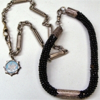 2 x  Victorian FOB chains incl ladies beaded Mourning with silver fittings and long link silver plated fob chain with  small Australian enamel medalli - Sold for $37 - 2017