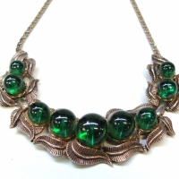 Vintage Australian Arcansas costume jewellery necklace - green glass balls set in silver toned stylised leaf design - Sold for $50 - 2017