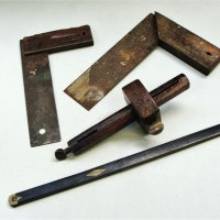 Group of c1900 tools inc Rosewood mortise gauge, ebony bezel gauge and Stanley set squares - Sold for $25 - 2017