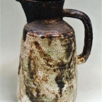 Post War Australian Pottery - Lucy Hatton Beck - lidded ceramic jug, 26cm - signed to base - Sold for $149 - 2017