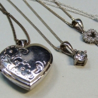 Group lot - 5 silver chains & pendants incl Large heart locket, pearl, key, stones etc - Sold for $50 - 2017