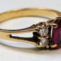 18ct ygold ladies ring with oval ruby & two dias either side - TW 27grms - Sold for $298 - 2017