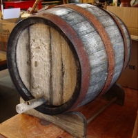 Oak Barrel can assorted cane items - Sold for $68 - 2017