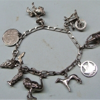 Group lot silver jewellery - charms bracelet with 9 charms, heart clasp, heart locket, charms etc - Sold for $56 - 2017