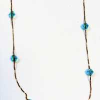 Dainty 18ct gold chain necklace interspersed with blue stones - Sold for $75 - 2017