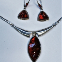 Group lot - silver contemporary necklace with brown amber pendant & pair silver amber earrings - Sold for $62 - 2017