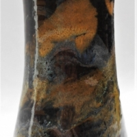 Australian pottery vase by Charles Wilton in black glaze with mottled colours 22cm tall - Sold for $25 - 2017