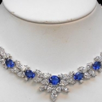 Ladies ornate silver bling necklaces set with blue stones & rhinestones - Sold for $68 - 2017