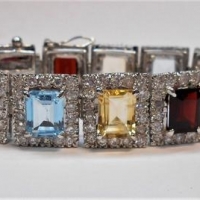 Ladies silver bling bracelet - square shaped coloured semi precious stones surrounded by rhinestones - Sold for $37 - 2017