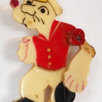 Art Deco celluloid popeye brooch with articulated arm - Sold for $31 - 2017