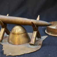 Group lot - Australian Trench Art incl inkwell with crossed bullet pen rest marked NE Co - Sold for $199 - 2017