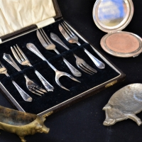 Group with Brass pig pin cushion, Silver compact, cased epns forks etc - Sold for $56 - 2017
