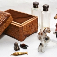 Group of small items incl two bottles with sterling silver lids, dog figurines, articulated fish etc - Sold for $62 - 2017
