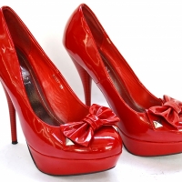 Pair of woman's Licean red patent heels with decorative bows - size 38 - Sold for $25 - 2017