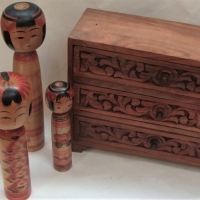 Small group lot wooden items incl family of 4 Japanese Kokeshi dolls & small 3 drawer cabinet - Sold for $137 - 2017