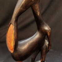 Vintage Abstract wooden sculpture - spoonbill man with distended stomach - Sold for $43 - 2017