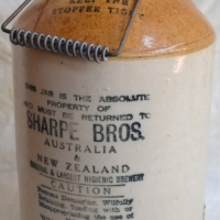 Vintage Sharpe Bros Stoneware demi john with metal handle screw top lid - Sold for $43 - 2017