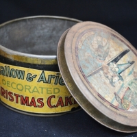 1928 Swallow & Ariel's Decorated Christmas cake tin Celebrating the Flight of Kingsford Smith in the Southern Cross - Sold for $99 - 2018